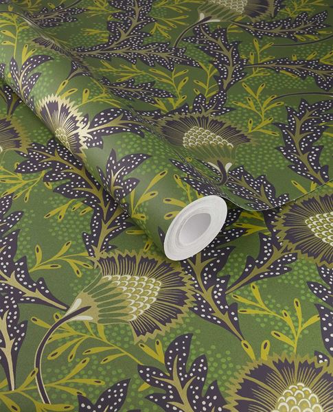 Banksia Bloom wallpaper by Eijffinger in forest green with chartreuse and aubergine thistle blooms, shown on a curled swatch