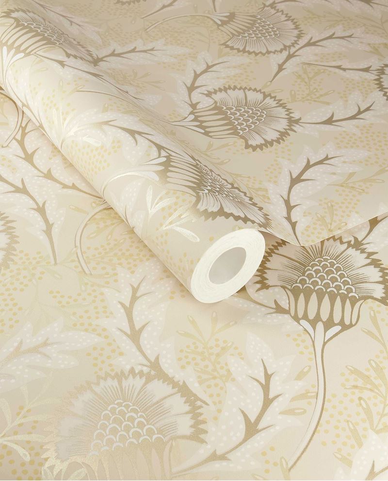 Banksia Bloom wallpaper by Eijffinger, cream and soft gold thistle floral motif shown on a partially unrolled swatch