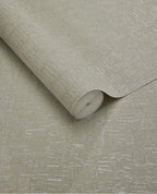 Bark Wash wallpaper by Eijffinger, rolled swatch in muted olive-tinged taupe with shimmering bark crackle texture