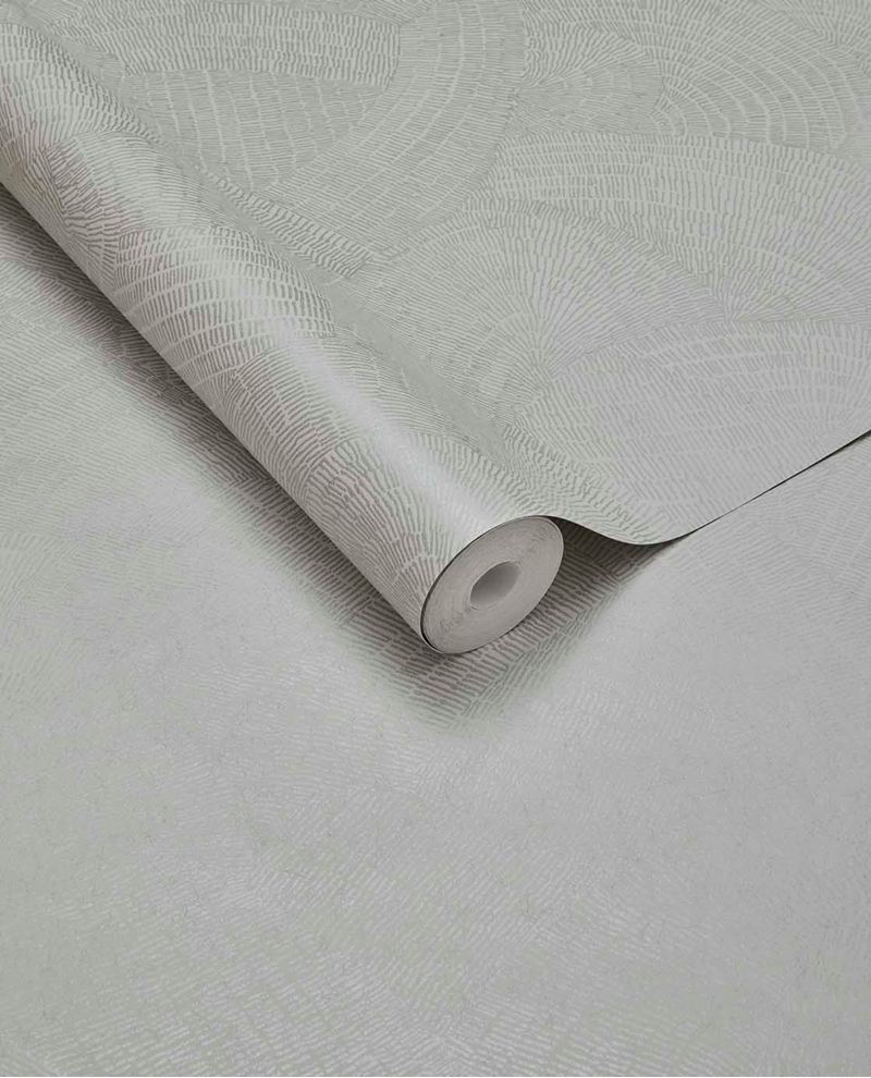 Scallop Fan wallpaper by Eijffinger, rolled swatch in soft pale grey with overlapping fanned scallop arcs of fine line texture