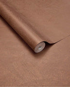 Scallop Fan wallpaper by Eijffinger, rolled swatch in warm terracotta copper showing the overlapping scallop fan motif