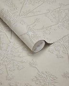 Cow Parsley wallpaper by Eijffinger, delicate seedhead design in soft ivory cream, partially unrolled roll swatch