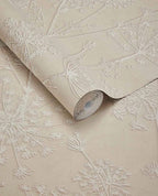 Cow Parsley wallpaper by Eijffinger, embossed seedhead silhouettes in warm taupe beige, partially unrolled roll