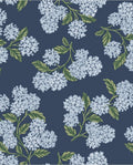 Hydrangea Bloom wallpaper by Eijffinger, pale blue hydrangea heads with green leaves on navy, flat swatch.