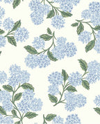 Hydrangea Bloom wallpaper by Eijffinger, soft blue hydrangeas with green leaves on cream, flat swatch.