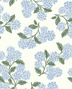Hydrangea Bloom wallpaper by Eijffinger, soft blue hydrangeas with green leaves on cream, flat swatch.