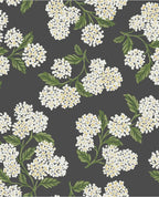 Hydrangea Bloom wallpaper by Eijffinger, white and yellow hydrangeas with green leaves on charcoal, flat swatch.