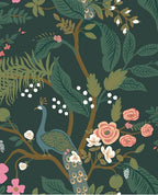 Peacock Perch wallpaper by Eijffinger, a blue peacock on a flowering branch with roses and foliage on a deep emerald green ground, flat swatch.