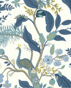 Peacock Perch wallpaper by Eijffinger, blue peacock with denim-blue leaves and soft roses on a crisp white ground, flat swatch.