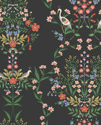 Heron Garden wallpaper by Eijffinger, white herons and bright florals in coral, blue and green on a black ground, flat swatch.