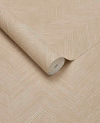 Soft Plaster Mural wall mural by Eijffinger, beige herringbone-textured roll partly unrolled on a flat surface