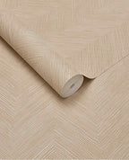 Soft Plaster Mural wall mural by Eijffinger, beige herringbone-textured roll partly unrolled on a flat surface