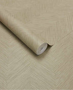 Woven Herringbone wallpaper by Eijffinger in greige, woven chevron texture on a partly unrolled roll