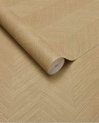Woven Herringbone wallpaper by Eijffinger in golden wheat, herringbone weave shown as an unrolled roll