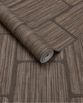Woven Grid wallpaper by Eijffinger in chocolate brown, grasscloth weave with grid panel outlines, rolled product shot