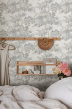 Raphael wallpaper by Sandberg in grey oak-tree print behind a bedroom shelf with wooden hangers and peonies