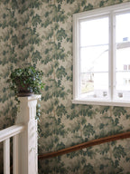 Raphael wallpaper by Sandberg in Green on a stair landing, with a white-framed window and painted banister