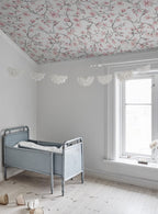 Sakura Sky wallpaper by Sandberg in Pink, styled on an interior wall