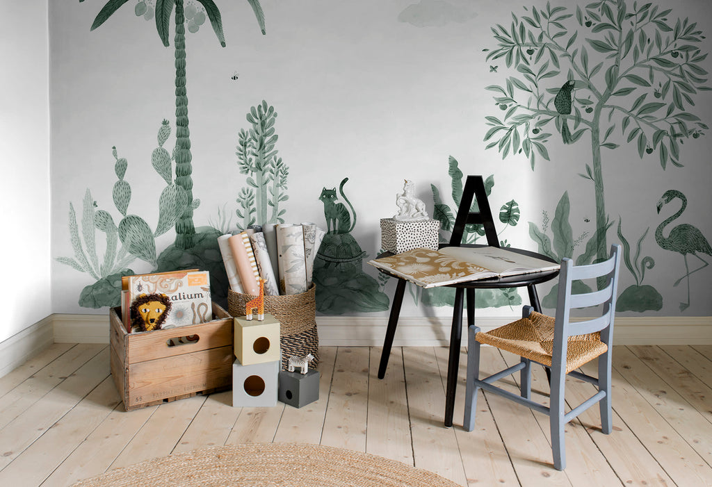 Wilton wall mural by Sandberg in green, styled in a kids room with timber crates and blue chair