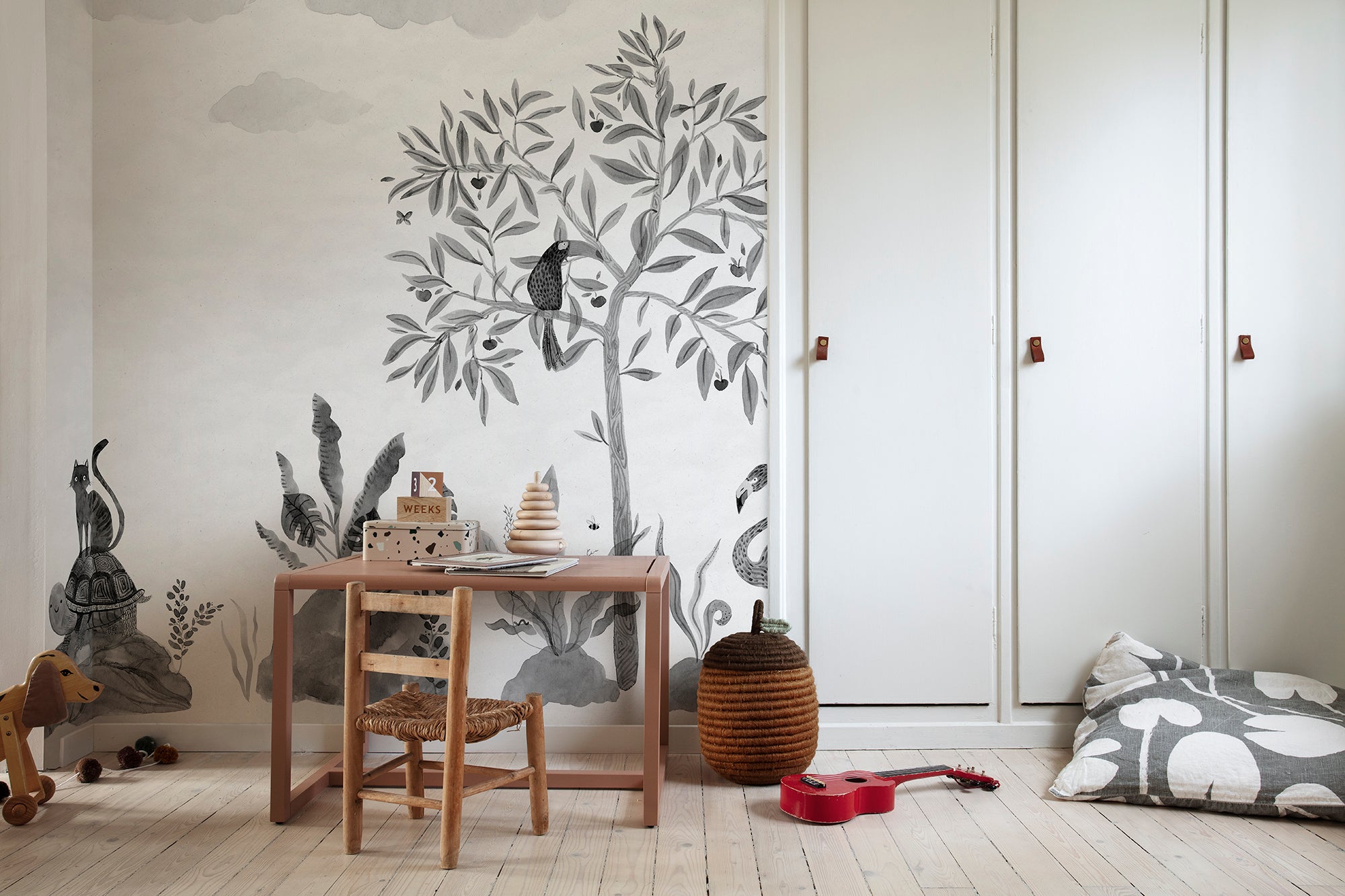 Wilton wallpaper by Sandberg in Graphite, styled on an interior wall