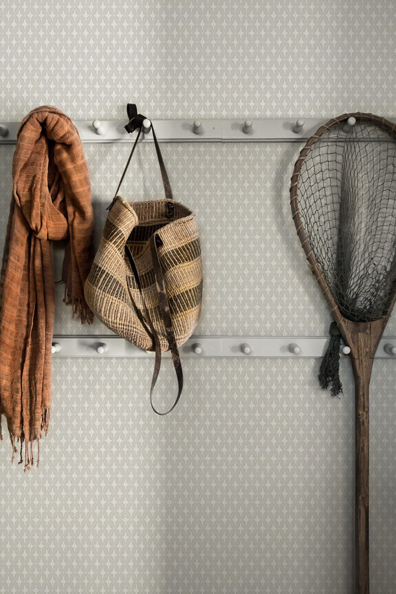 Einar wallpaper by Sandberg in Grey, styled on an interior wall