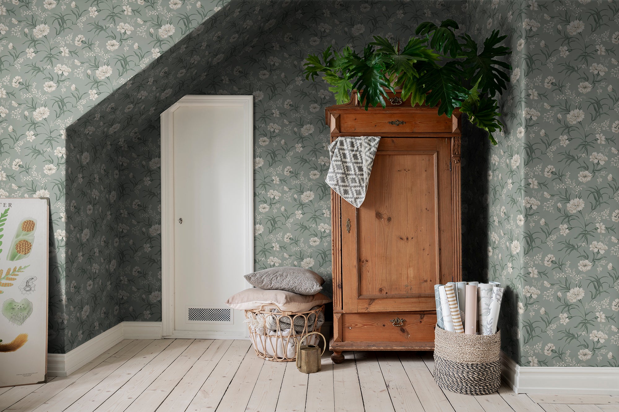 Emilie wallpaper by Sandberg in Garden Green, styled on an interior wall