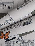 The Butterfly Effect wallpaper by Långelid/von Brömssen in Orange - animals design, rolls shown with the newsprint paper