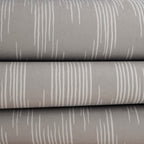 Ikat wallpaper by Langelid/von Bromssen - geometric design in Cream