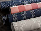 Ikat wallpaper by Langelid/von Bromssen - geometric design in Cream