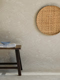 Plenty more Fish wallpaper by Långelid/von Brömssen in Beige - animals design, behind a bench with a woven wall disc