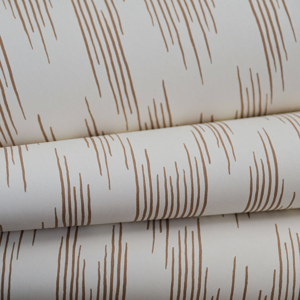 Ikat wallpaper by Langelid/von Bromssen - geometric design in Brown