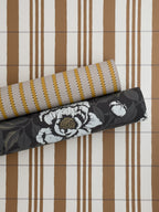 The Guards' Tent wallpaper by Langelid/von Bromssen - stripe design in Brown