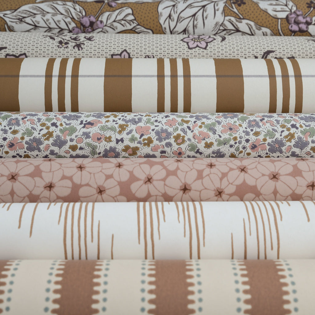 Ikat wallpaper by Langelid/von Bromssen - geometric design in Brown