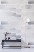 Close-up of River wall mural by Emma Hayes showing layered soft grey and white watercolour brushstrokes beside a chrome