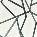 Sumi wallpaper by Harlequin, close-up flat swatch of charcoal geometric brushstroke lines on a white ground