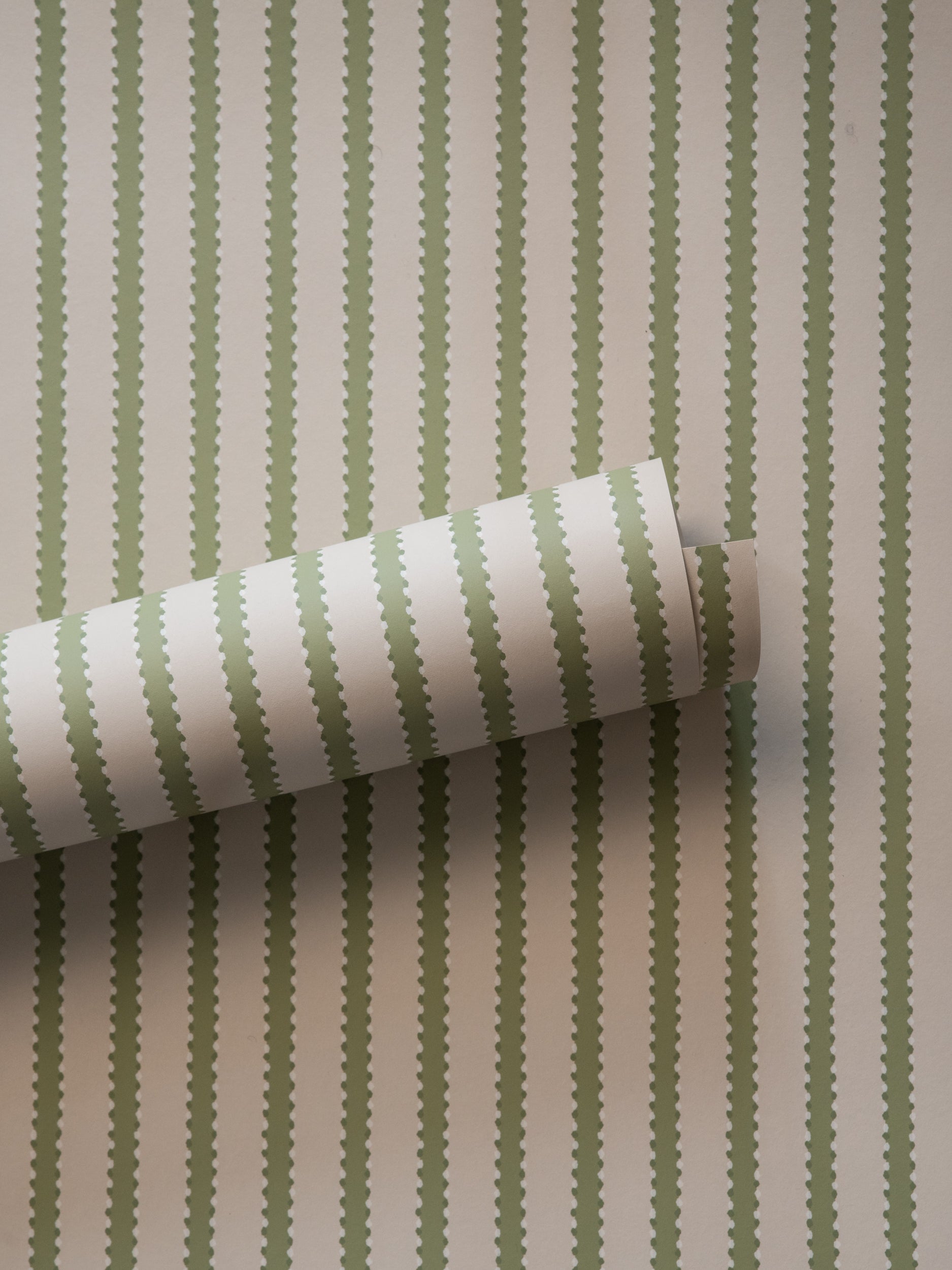 Stitched Stripe wallpaper by Langelid/von Bromssen - stripe design in Green
