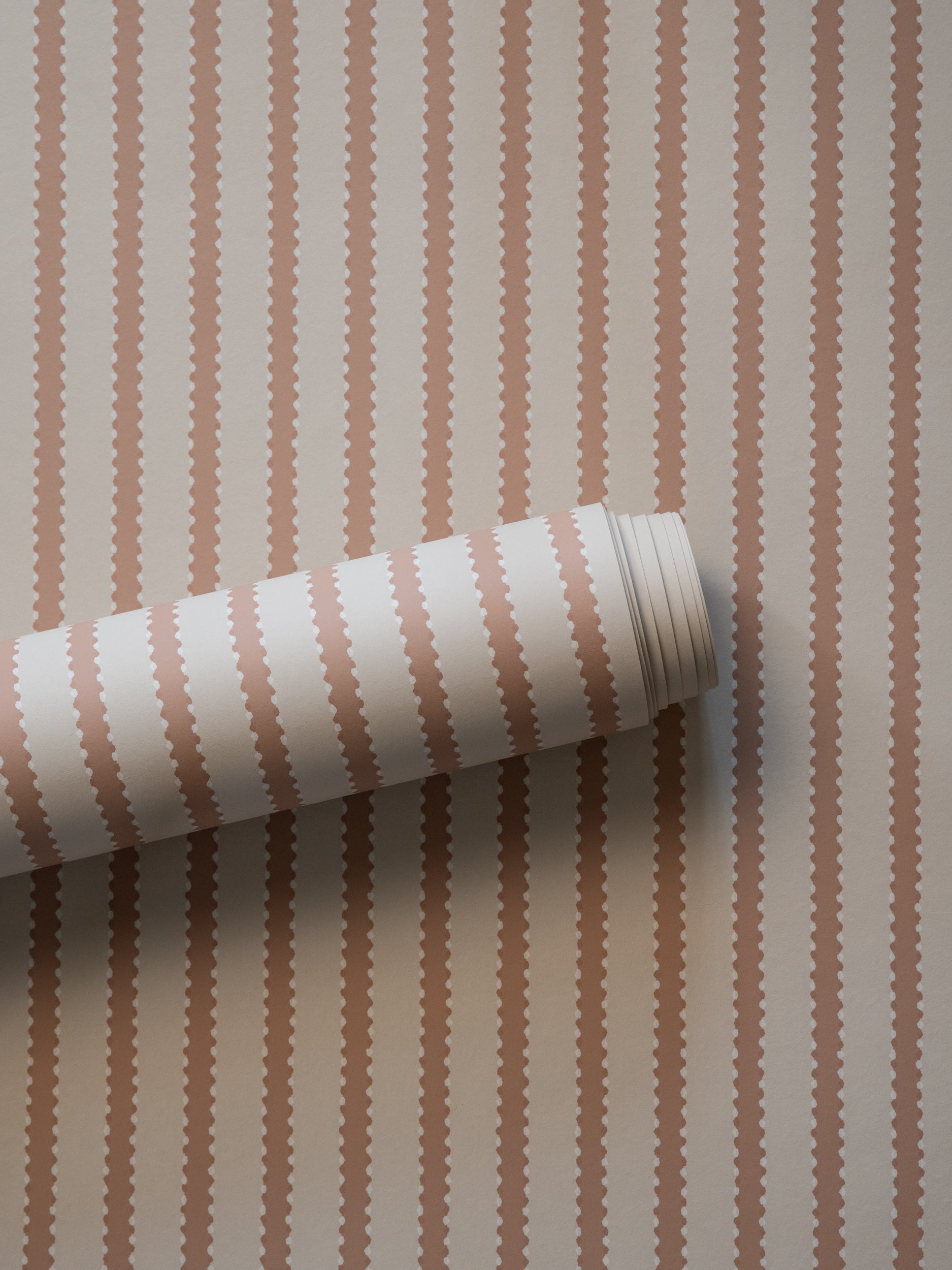 Stitched Stripe wallpaper by Langelid/von Bromssen - stripe design in Pink