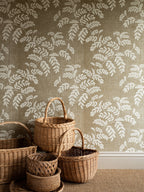 Acacia wallpaper by Långelid/von Brömssen in Beige – botanical design, with a group of wicker baskets