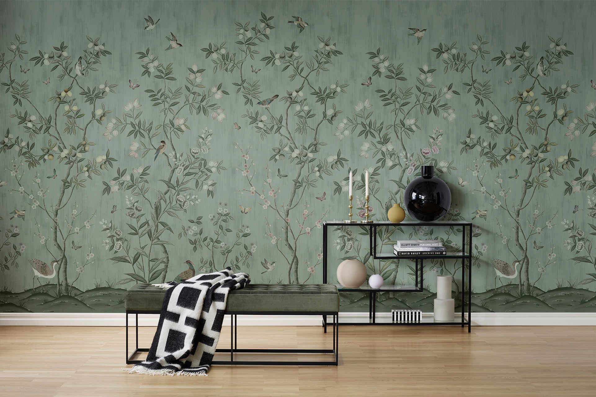 Chinoiserie Chic wallpaper by Rebel Walls in Green, styled on an interior wall
