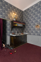 Saint Sebastian wallpaper by Rebel Walls in Blue, styled room