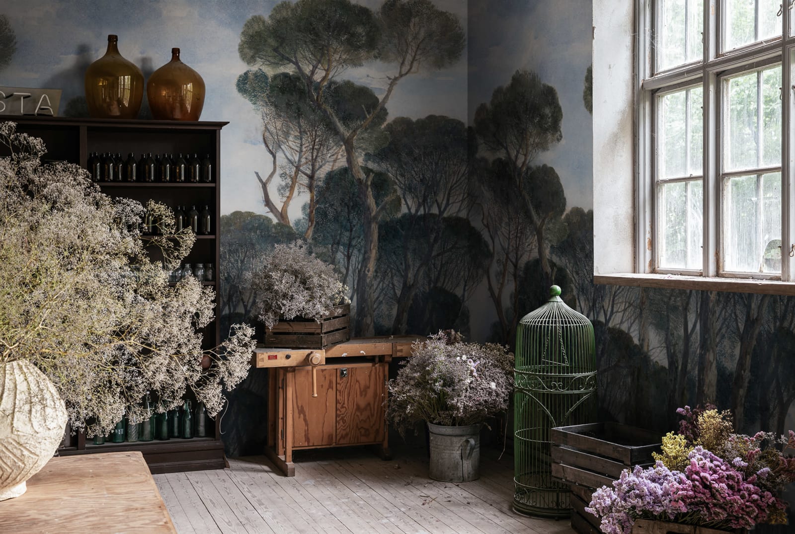 Umbrella Pines - Green wall mural by Rebel Walls, styled room