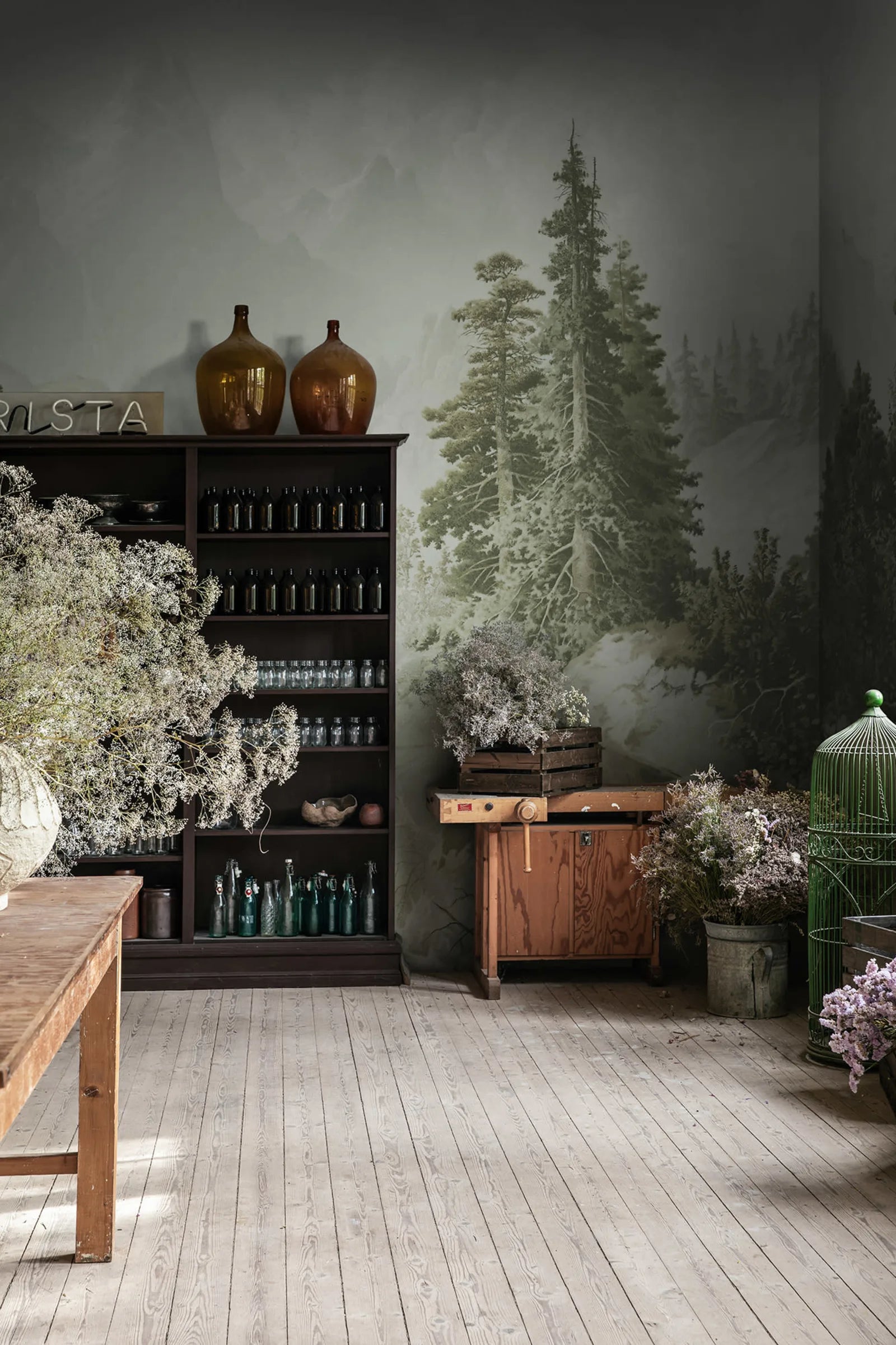 Mountain Horizon - Green wall mural by Rebel Walls, styled room