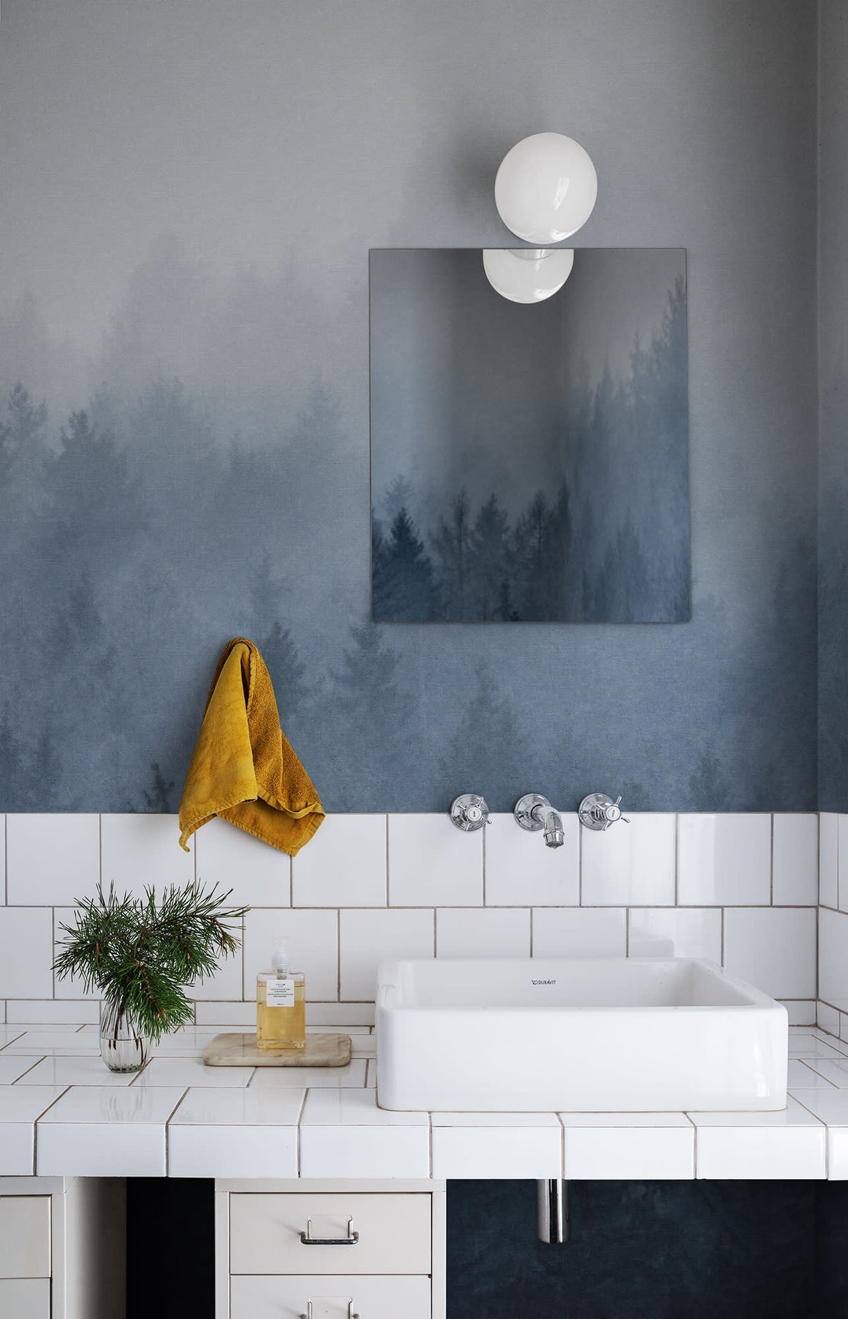 Cloudy Forest wall mural by Rebel Walls in Blue, styled room
