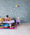 Happy Rebel wall mural by Rebel Walls in Blue – Blue Chess, styled room