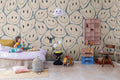 Happy Rebel wall mural by Rebel Walls in Beige – Peach, styled room