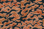 Guppy wall mural by Rebel Walls, flat panel of the burnt orange and dark navy watercolour swirl pattern