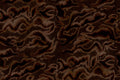 Guppy wall mural by Rebel Walls, flat panel of the deep chocolate brown watercolour swirl pattern