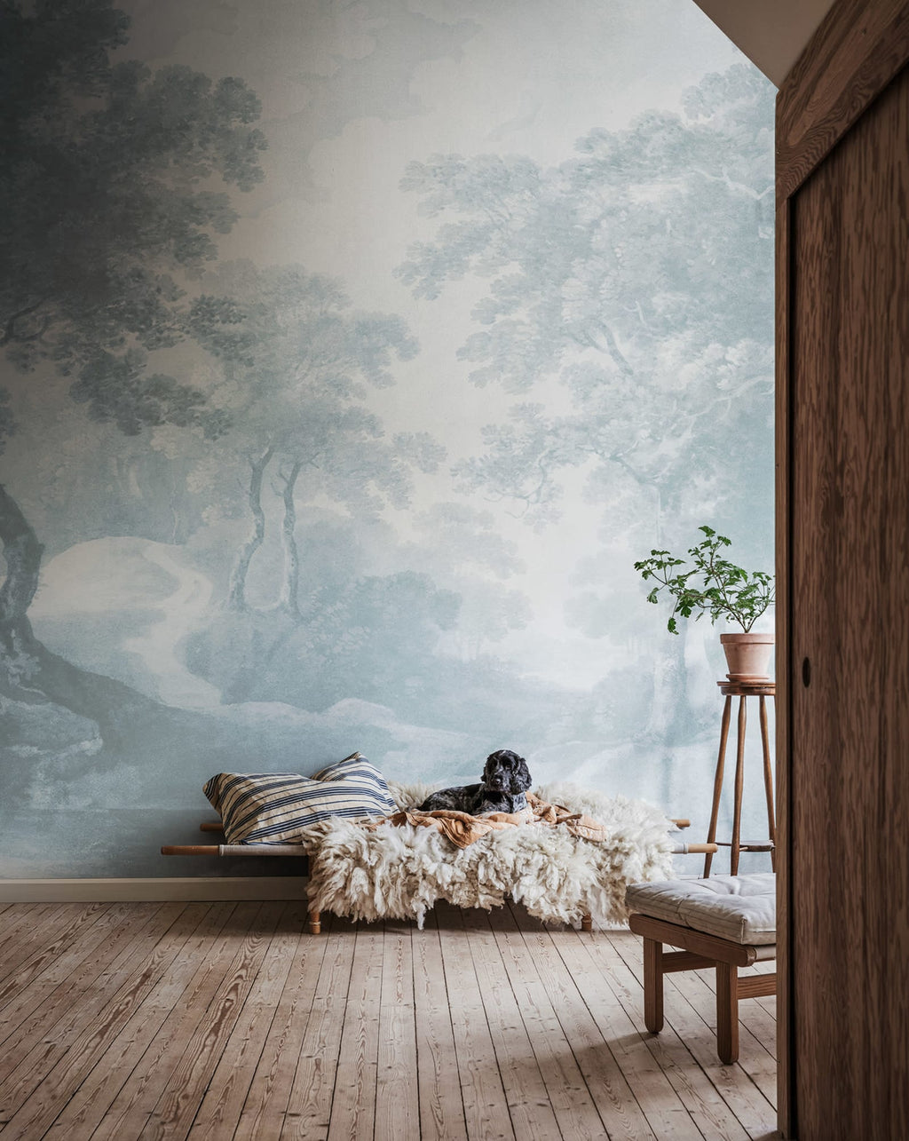 The Vintage Grove - Blue wall mural by Rebel Walls, styled room