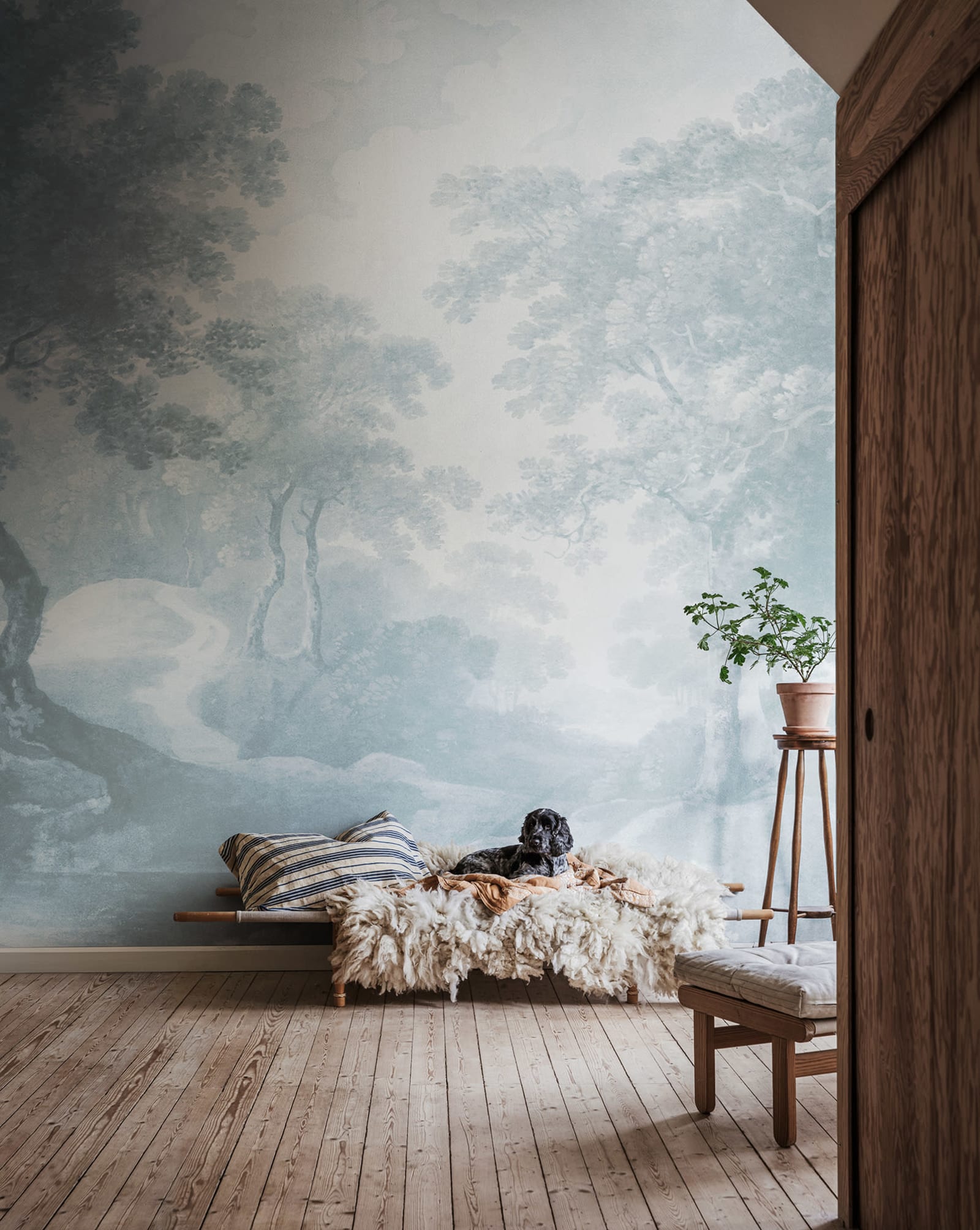 The Vintage Grove - Blue wall mural by Rebel Walls, styled room