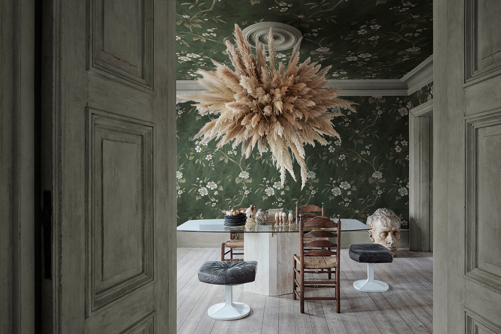 Poetic Flora wall mural by Rebel Walls in Green, styled room